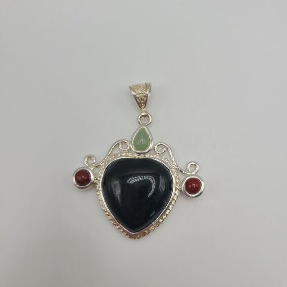 Elegant Silvertoned Pendant with Black and Red Accents - Picture 5 of 5